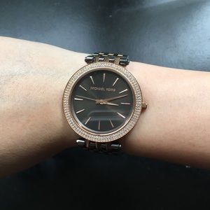 Black and gold MK watch